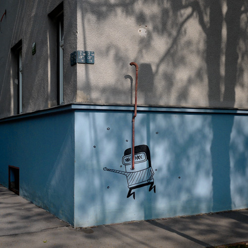 Grafitti of underwater swimmer on apartment wall, Ljubljana, Slovenia.