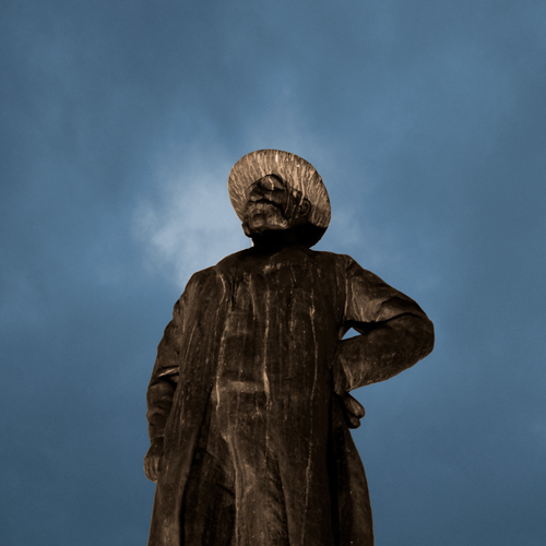 Sculpture of man against evening sky in Rijeka, Croatia